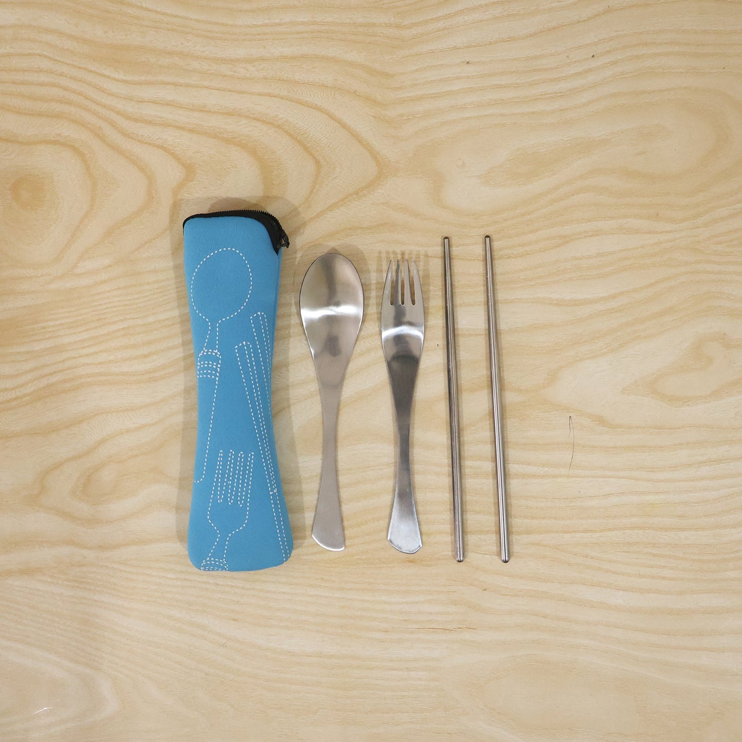Wukusy 4-in-1 portable cutlery set with steel spoon, fork, and chopsticks in a compact pouch.