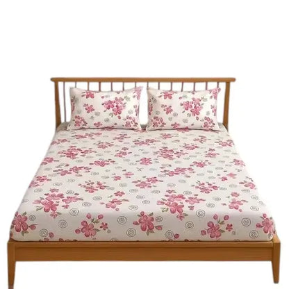 King size floral cotton fitted bedsheet with two pillow covers from Ekom, featuring a vibrant, floral design for a cozy bedroom look.