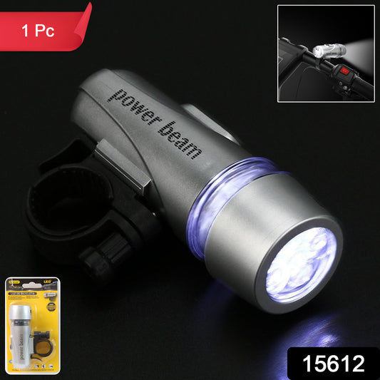Wukusy Power Beam LED bicycle headlight mounted on a bike handlebar, bright white light for nighttime cycling visibility.