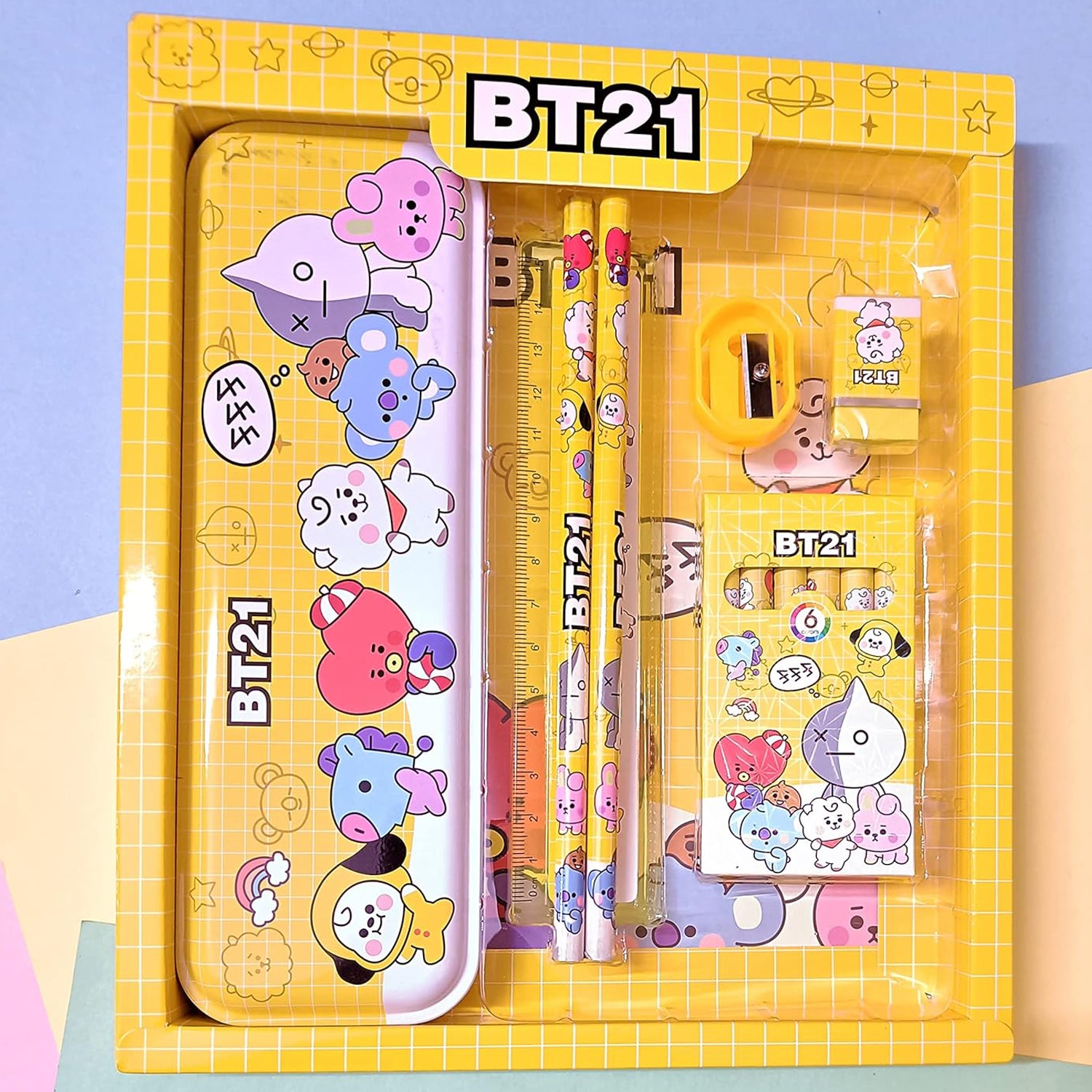 Wukusy 3294 stationery kit for kids includes metal pencil box, sharpener, pencil, and eraser set in a 12-piece school supply set.