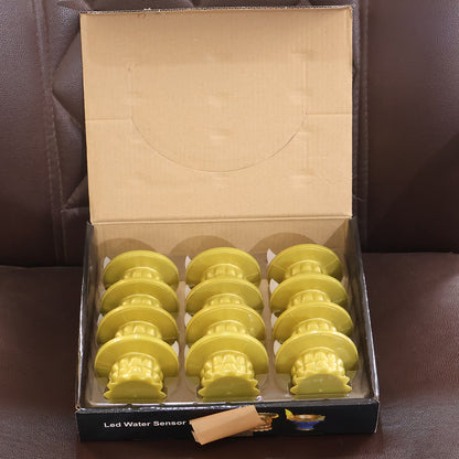 Set of 12 Wukusy water sensor LED golden diyas for home decor, featuring traditional design with glowing LED lights.