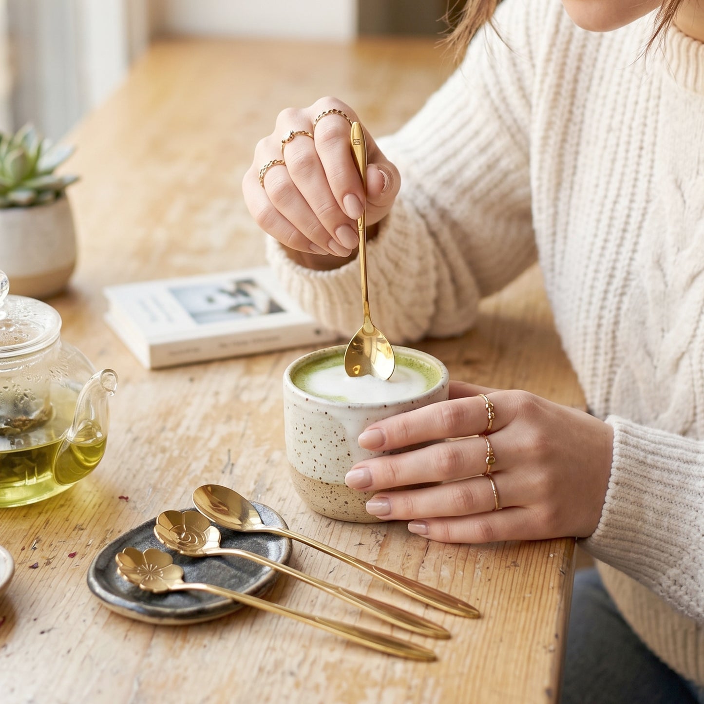 Set of four golden mini steel serving spoons for dessert, tea, and coffee by Wukusy, ideal for home use.