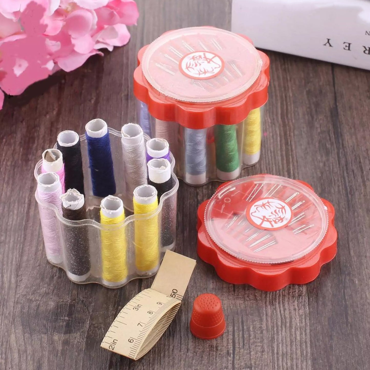 Wukusy 6050 24-piece sewing box with compartments for thread spools and sewing supplies, used for home sewing and storage.