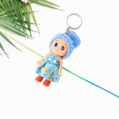 Cute soft toy doll Rakhi with keychain by Wukusy, decorative and colorful for kids, suitable as a fancy Rakhi or keyring for boys and girls.
