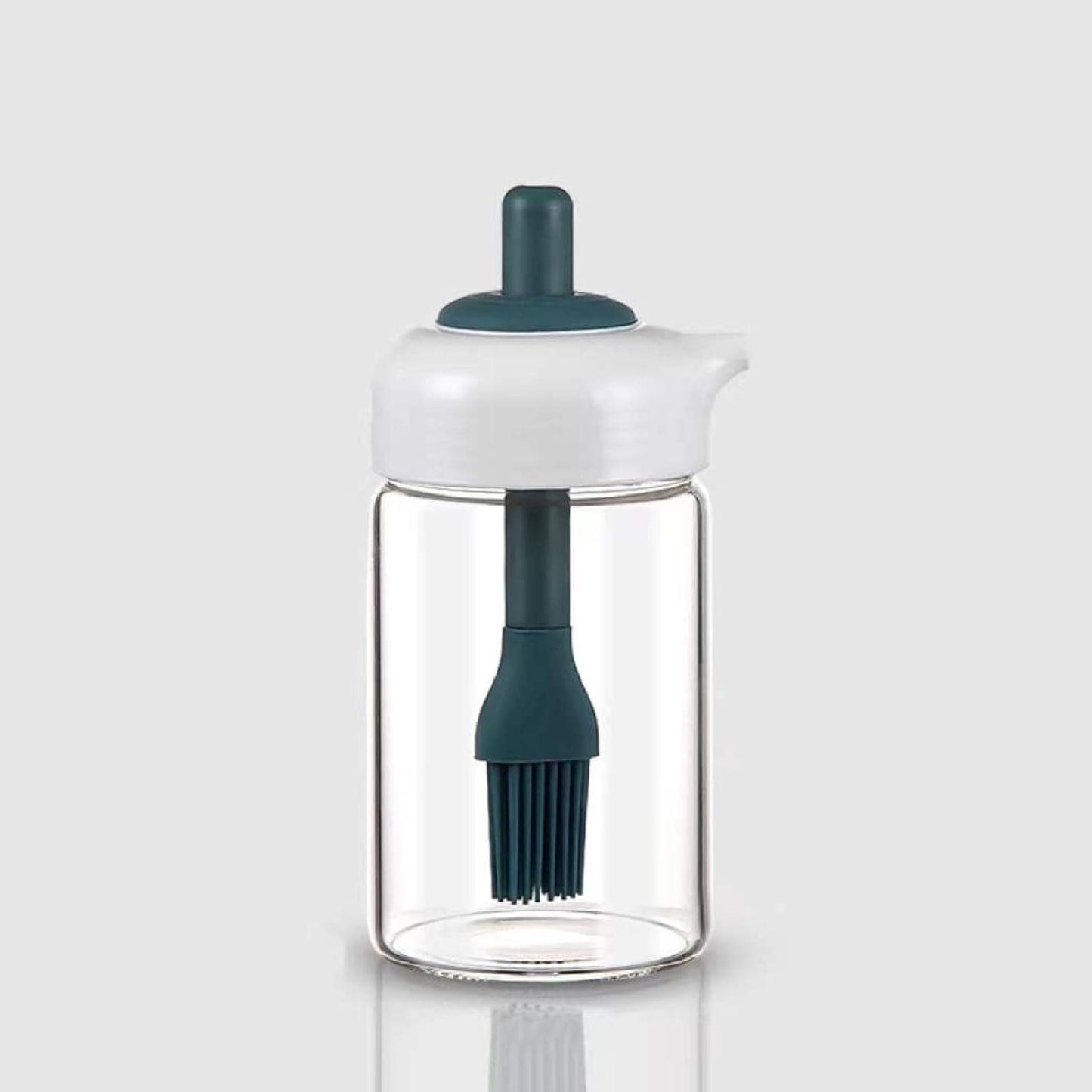 Wukusy 2-in-1 glass oil dispenser jar with brush, featuring a clear bottle and integrated brush for cooking and seasoning.