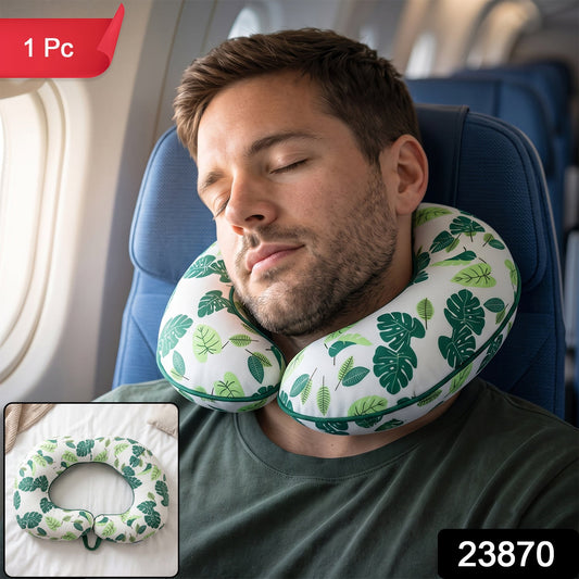 Green leaf print U-shaped travel neck pillow by Wukusy, soft head support for comfortable travel rest.
