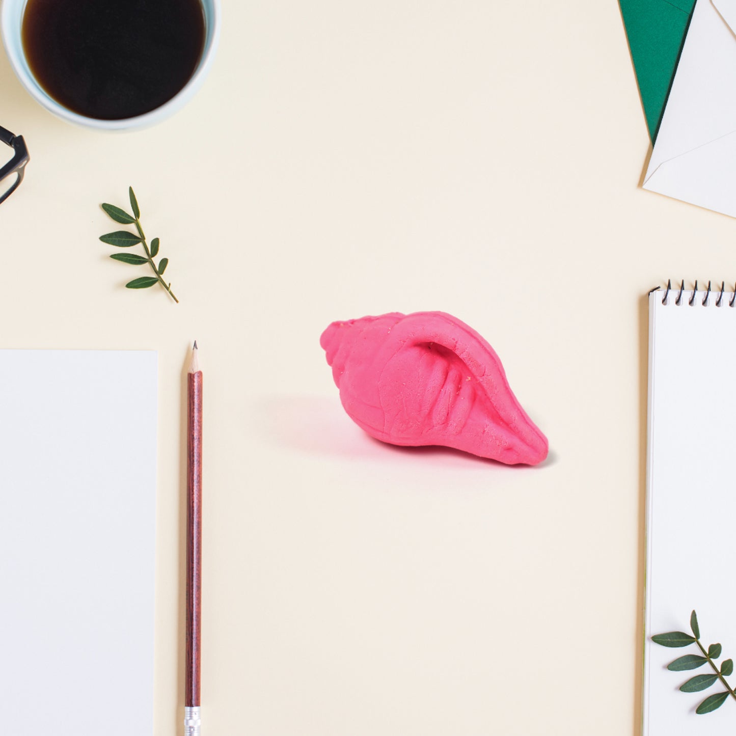 Wukusy shankh shape eraser rubber in mixed colors, designed for office use, featuring a unique shell-like shape and vibrant finish.