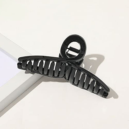 Wukusy plastic hair claw clip in mixed colors and designs, strong and durable for securing hair styles.
