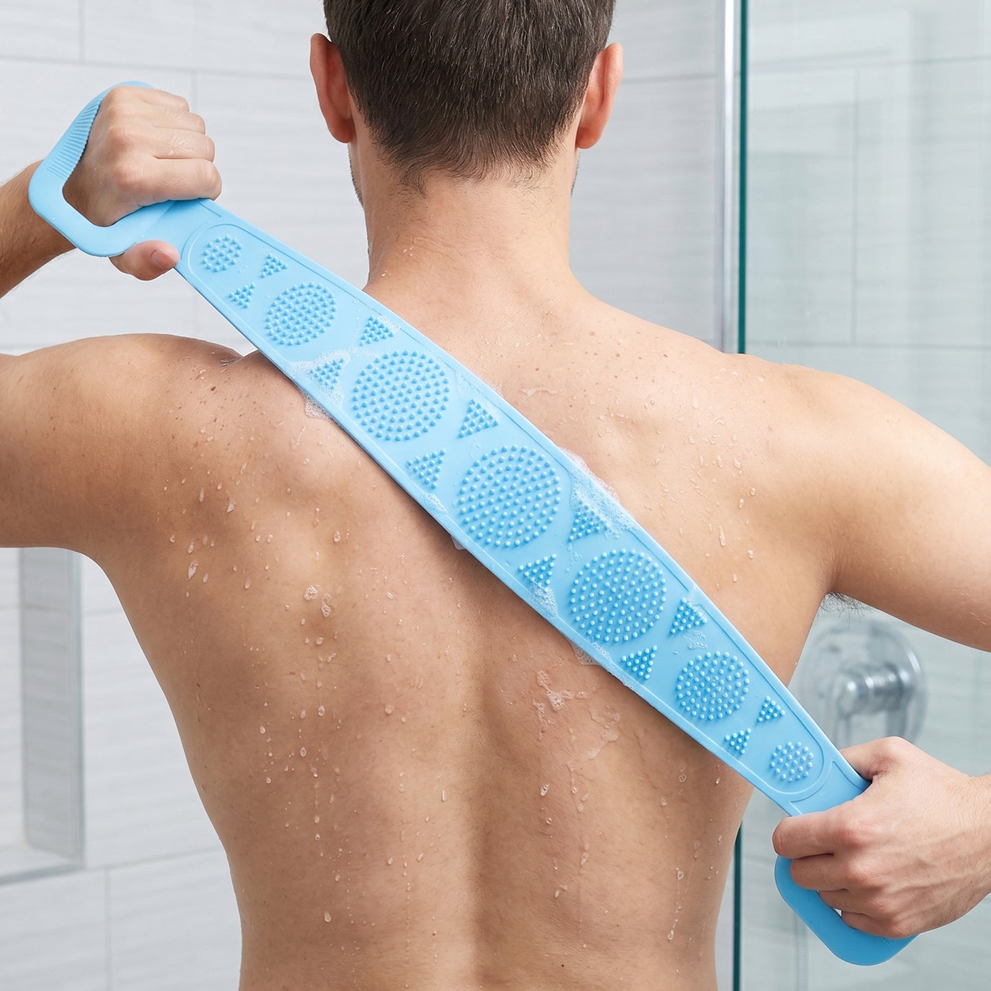 Wukusy long silicone body back scrubber belt for bath, soft and flexible for exfoliating and cleansing skin during shower.