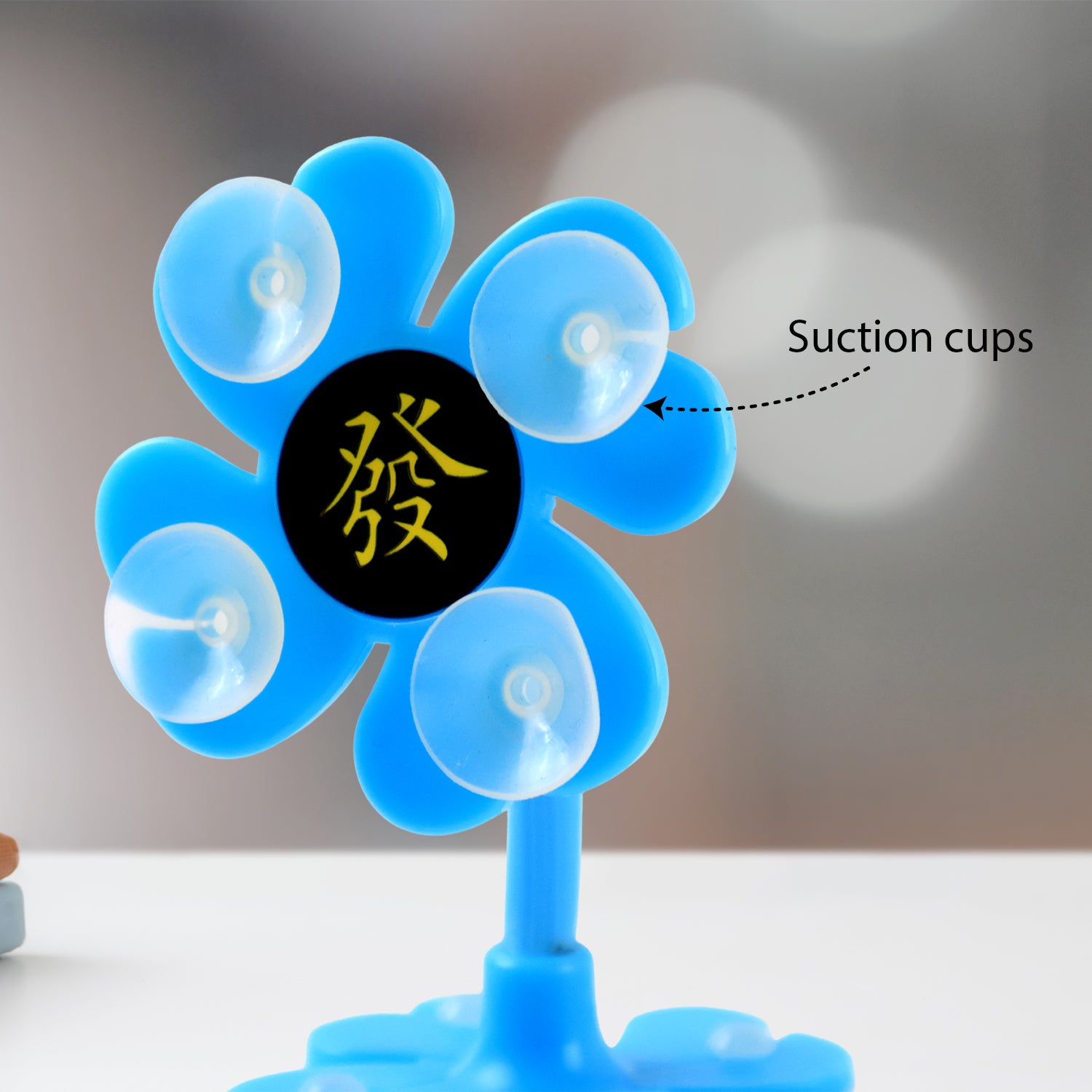 Colorful Wukusy 360° rotatable flower-shaped cellphone holder car mount with sucker stand, suitable for mobile devices.