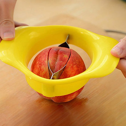 Wukusy Mango Cutter Chopper Slicer with stainless steel blade for easy mango slicing and peeling in the kitchen.