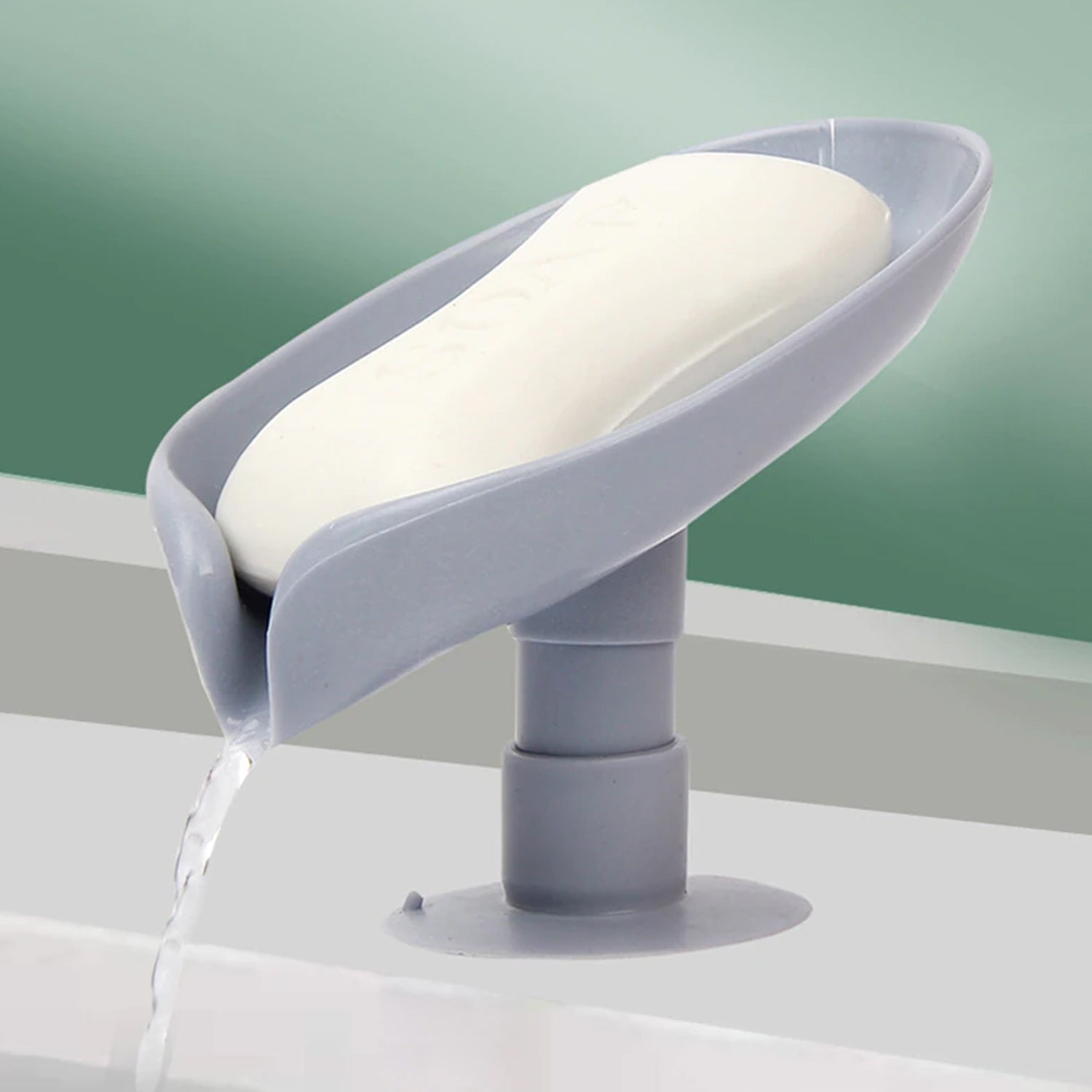 Wukusy self-draining soap holder with leaf-shaped design, suitable for bathroom or kitchen soap dishes and trays.