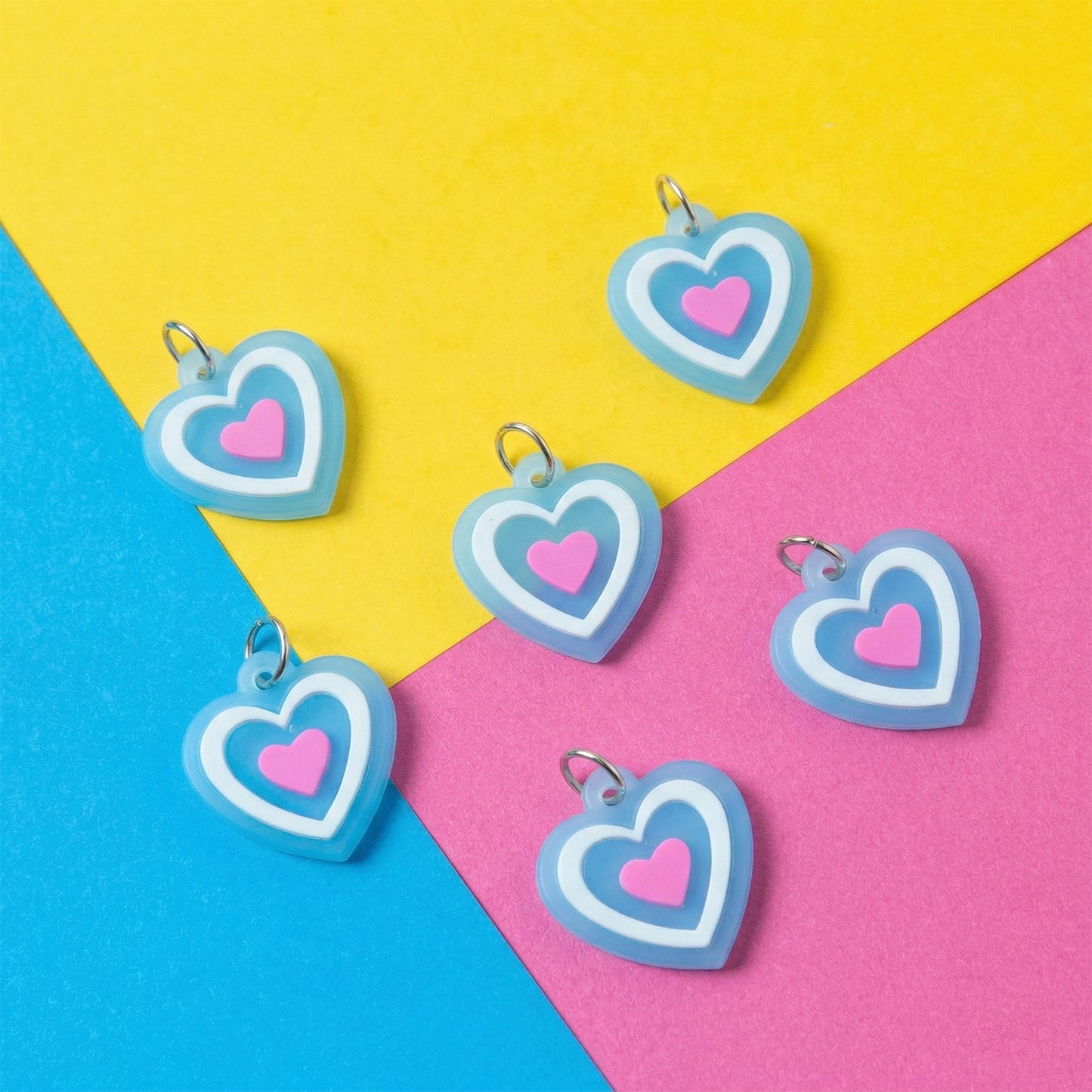 Set of 10 cute heart-shaped bag charm keychains by Wukusy, featuring colorful and decorative accessories for bags or keys.