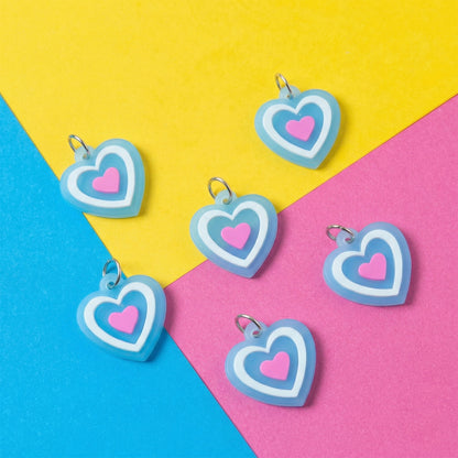 Set of 10 cute heart-shaped bag charm keychains by Wukusy, featuring colorful and decorative accessories for bags or keys.