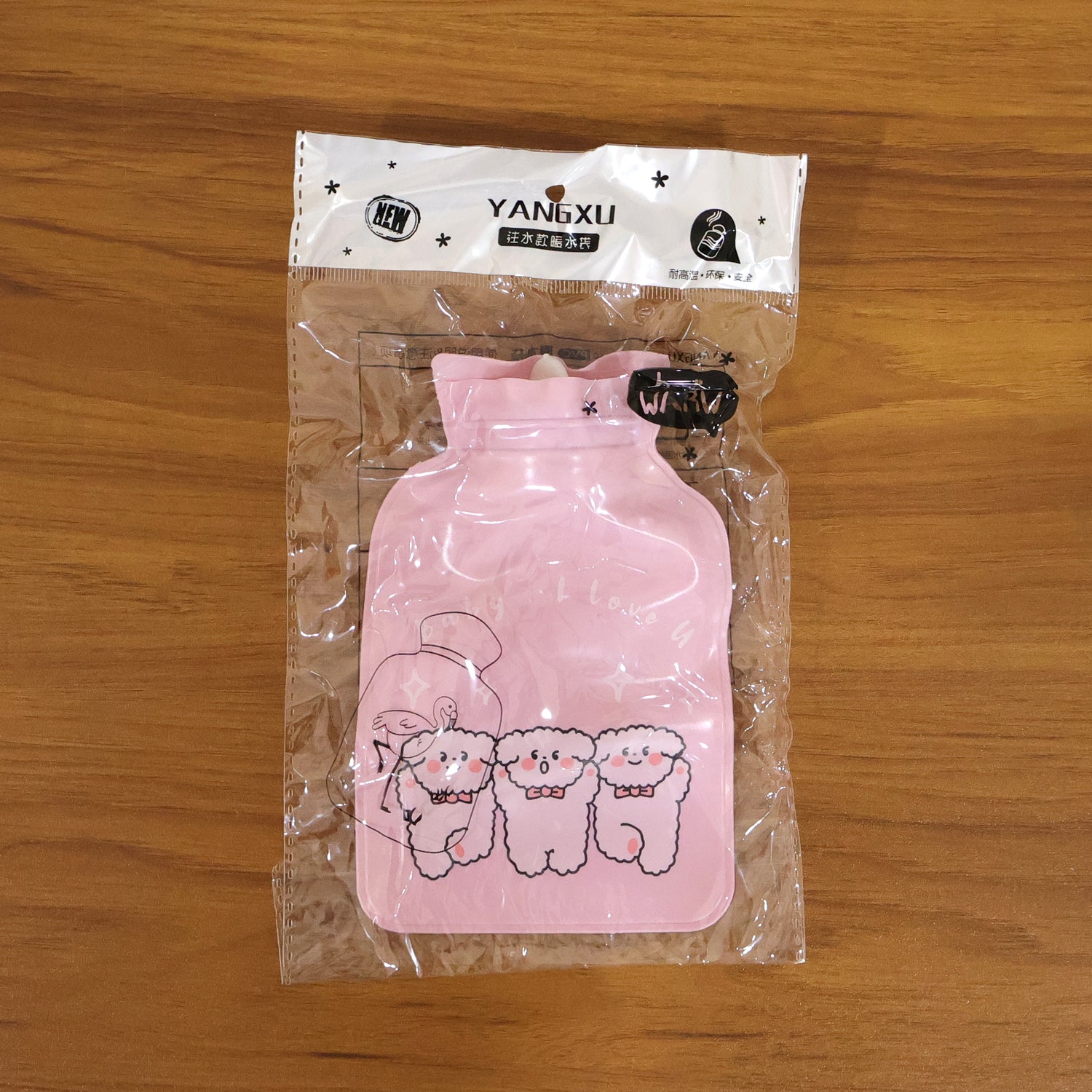 Cute printed mini water bag by Wukusy, 15x9 cm, suitable for hot and cold therapy, with colorful floral design.