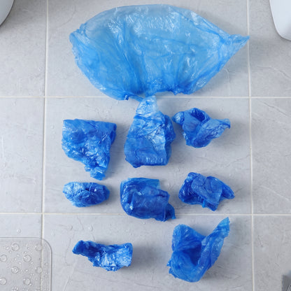 Wukusy disposable plastic shoe covers with elastic fit, shown in a set of 100, protecting shoes during cleaning or medical tasks.