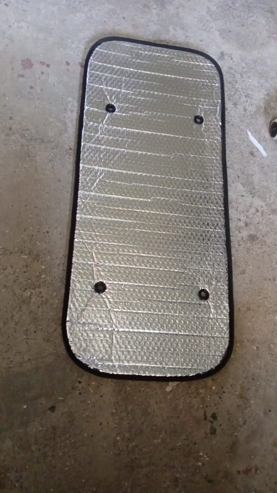 Wukusy 8511 automotive windshield sunshade blocks UV rays, keeps cars, SUVs, trucks, and vans cool during sunny days.
