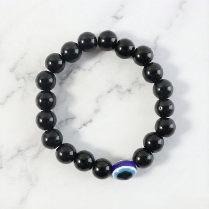 Elegant dual-tone crystal beaded stretch bracelet by Wukusy featuring sparkling beads and a sleek, stylish design.