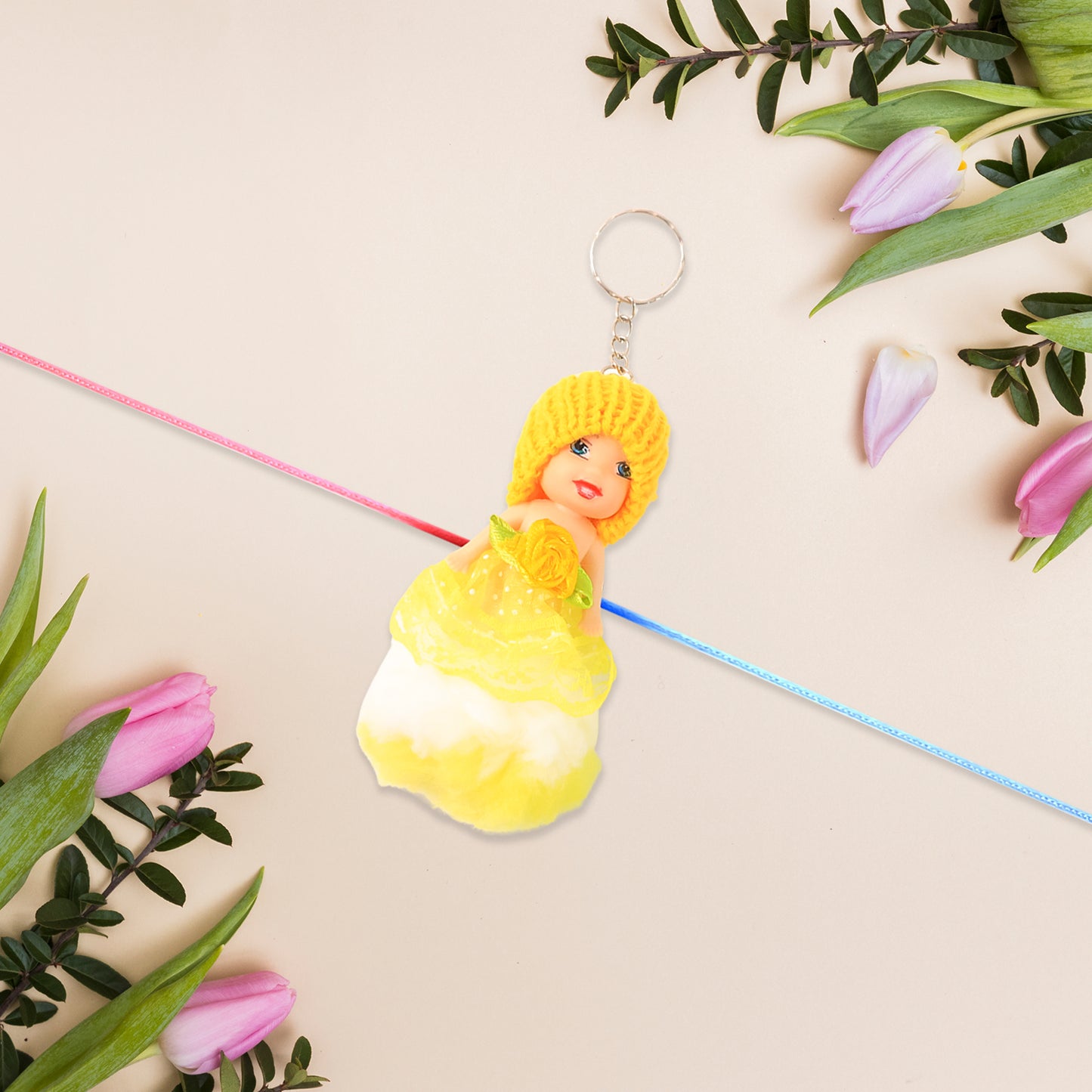 Cute soft toy doll Rakhi with keychain from Wukusy, decorative and fun for kids, suitable for boys and girls.