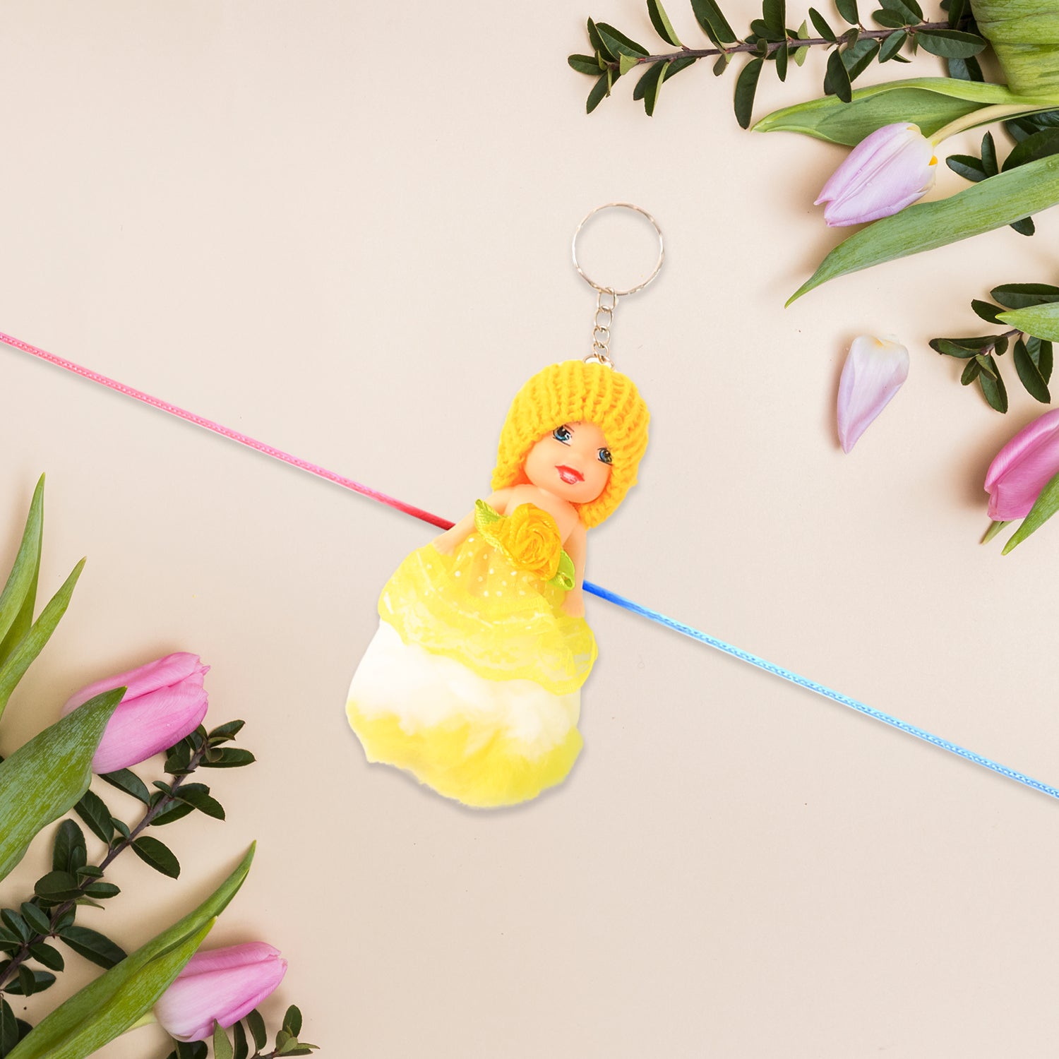 Cute soft toy doll Rakhi with keychain from Wukusy, decorative and fun for kids, suitable for boys and girls.