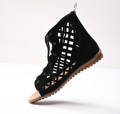 Black women's sandal from Drpshippr's men's collection, featuring a stylish open-toe design and comfortable flat sole.