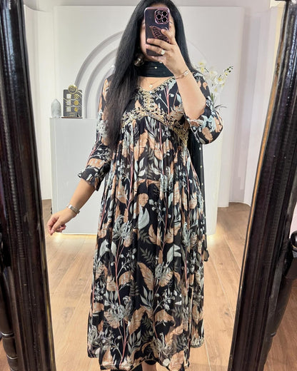 Black embroidered suit from Drpshippr featuring intricate embroidery, traditional design, and elegant fabric for formal wear.
