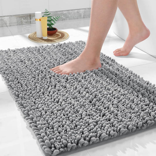 Gray Seasons soft bath mat for bathroom with plush, absorbent surface and non-slip backing for safety and comfort.