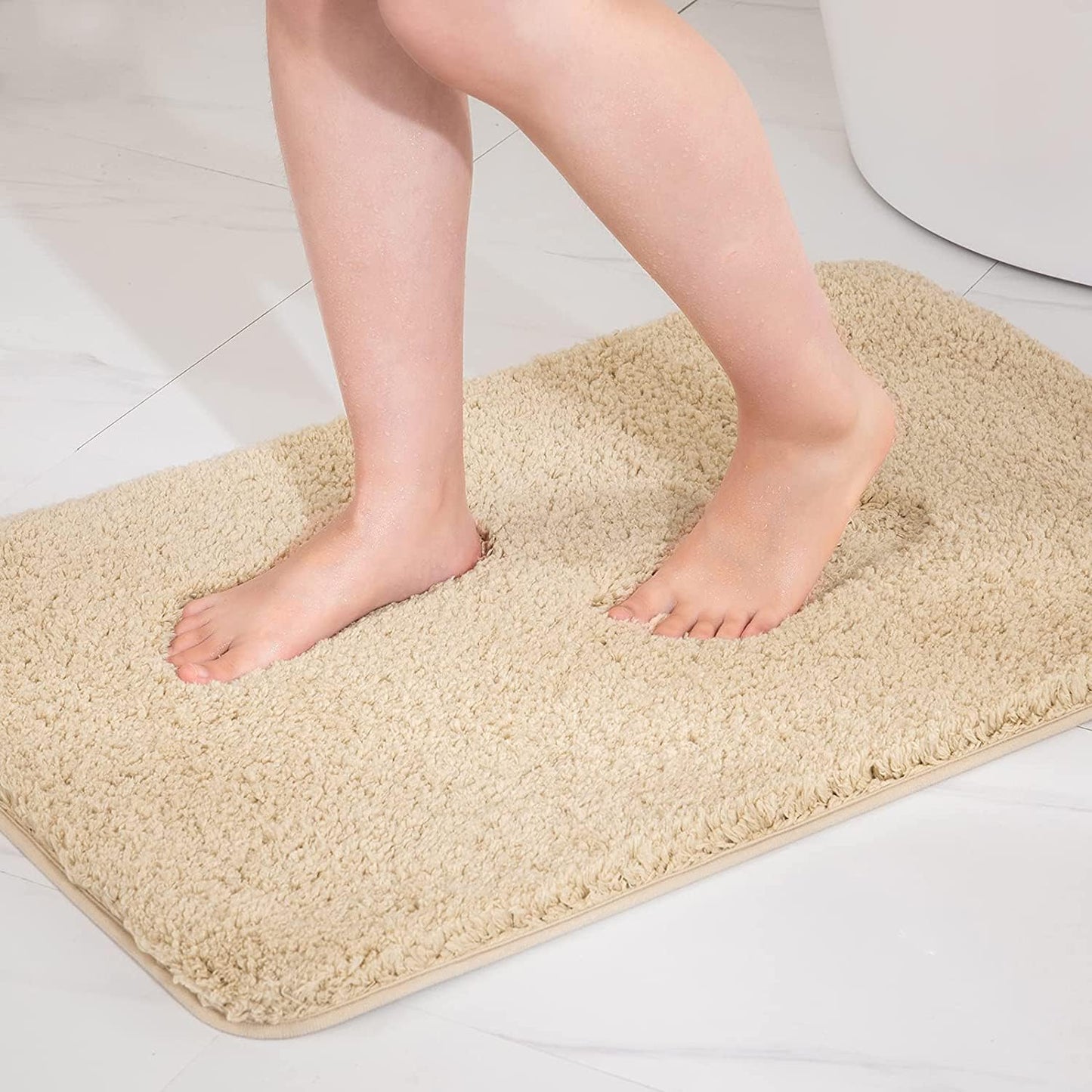 Seasons microfiber bathroom mat with plush texture and absorbent surface, ideal for bathroom floors.