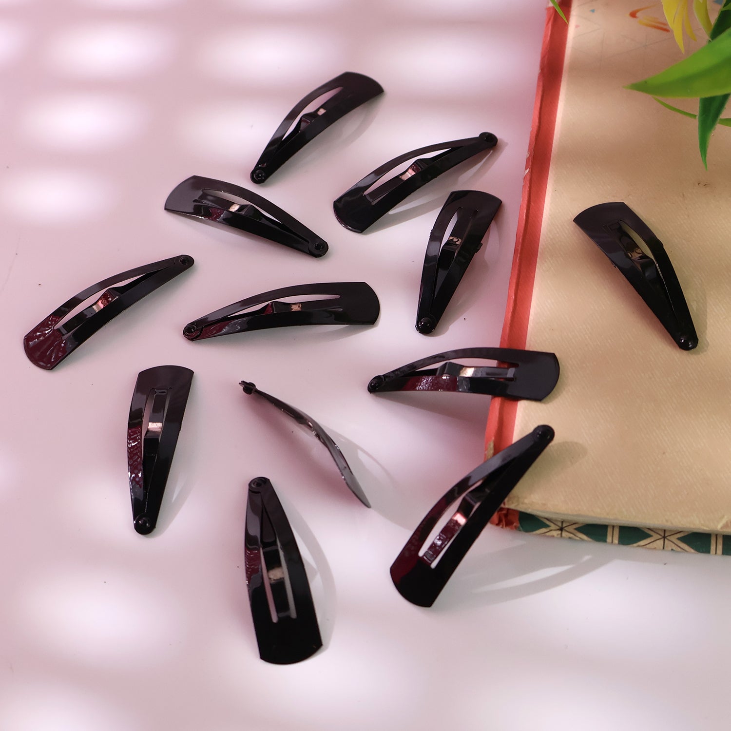 Set of 12 Wukusy Metal Tik Tak Hair Clips with sleek, shiny finish, ideal for styling and securing hair in various hairstyles.