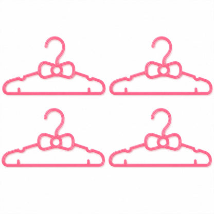 Set of four Wukusy kids plastic clothes hangers with cute bow design, ideal for baby wardrobe organization.