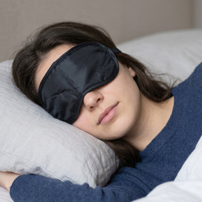 Wukusy 3-in-1 travel comfort kit with black neck pillow, eye mask, and earplugs for relaxing travel experiences.