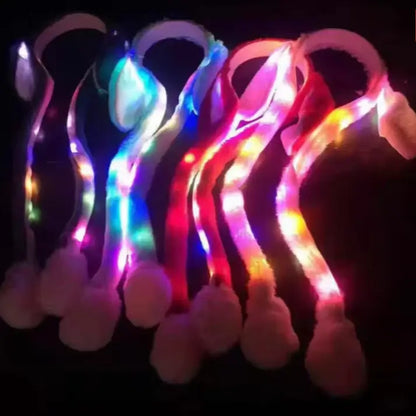 Cartoon glowing rabbit hat by Ekom with plush bunny ears and LED light, featuring a soft beanie and playful design.