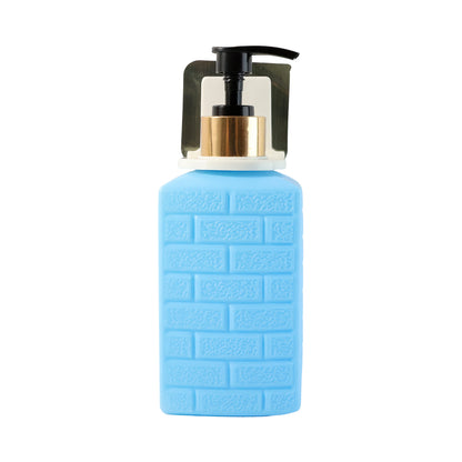 Wall-mounted Wukusy liquid soap dispenser set installed on bathroom wall, with sleek design and pump mechanism visible.