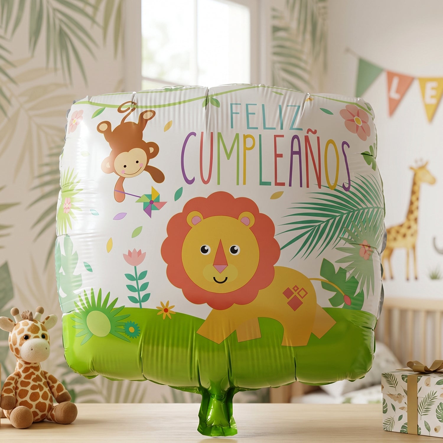 Gold lion foil balloon with jungle theme and birthday design, featuring vibrant jungle foliage and playful lion illustration.