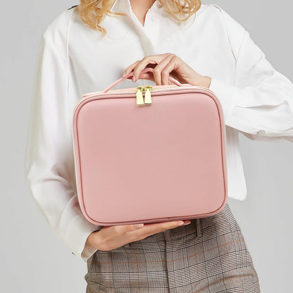Pink premium LED light makeup organizer box by Wukusy with compartments for cosmetics and accessories.