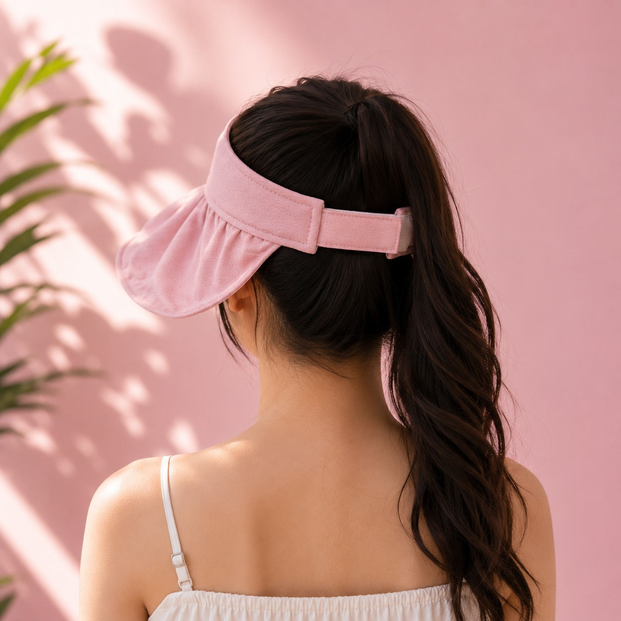 Women’s wide brim sun visor cap by Wukusy with adjustable strap, perfect for summer sun protection, in a random color.