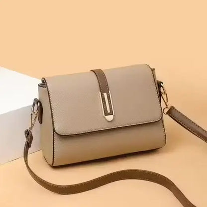 Ekom leather sling bag for women, stylish crossbody purse with adjustable strap, ideal for everyday use and casual outings.