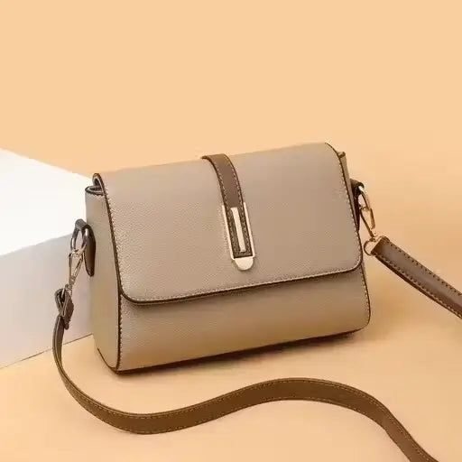 Ekom leather sling bag for women, stylish crossbody purse with adjustable strap, ideal for everyday use and casual outings.