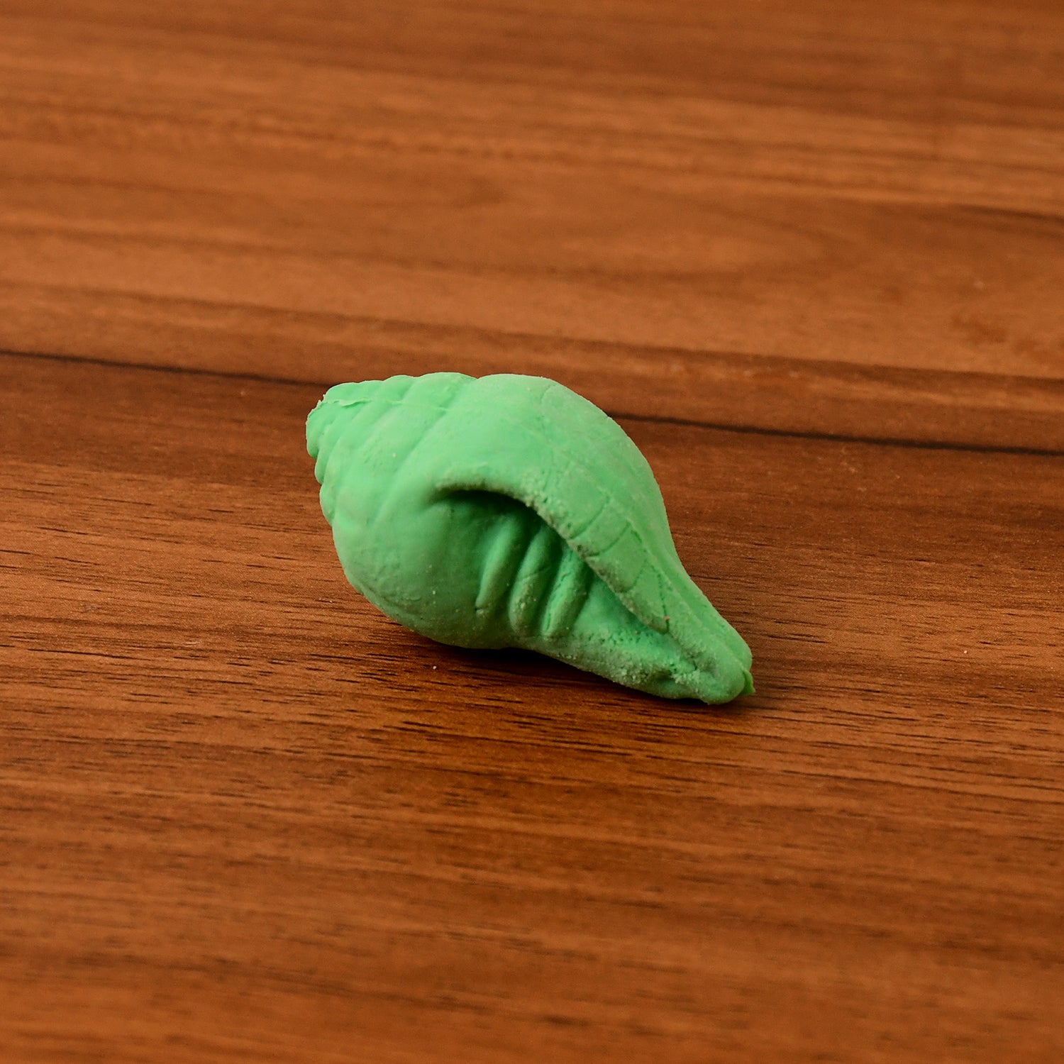 Set of 20 Wukusy Shankh shape rubber erasers in mixed colors, designed for office use with decorative and functional appeal.