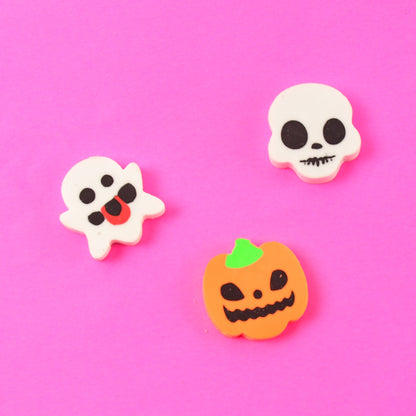 Set of 50 Wukusy cartoon shape rubber erasers in mixed colors and designs, ideal for office and school use.