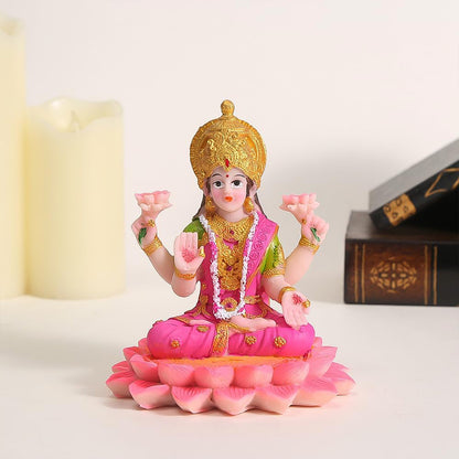 Decorative Lakshmi Mata idol sitting on a lotus flower, crafted by Wukusy, showcasing intricate details and vibrant colors.