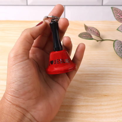 Wukusy mini hand bell with keychain, small portable brass bell attached to a keyring for easy use and decoration.