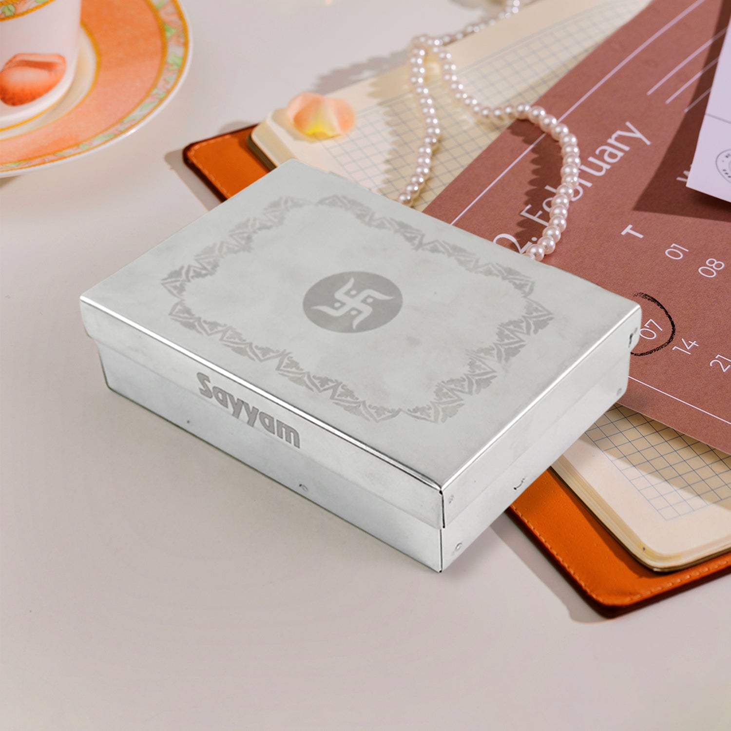 Wukusy stainless steel jewelry storage organizer box with 6 compartments for organizing rings, necklaces, and small accessories.