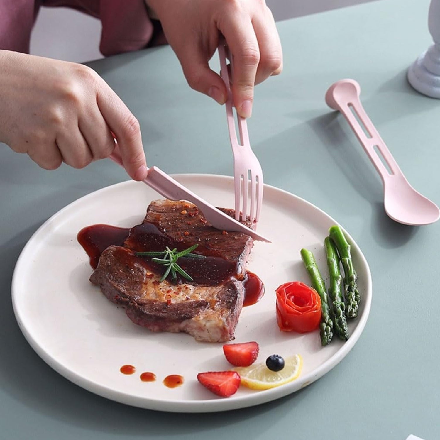 Set of three Wukusy 3-in-1 reusable kitchen spoon, knife, and fork tableware tools arranged together in this image.