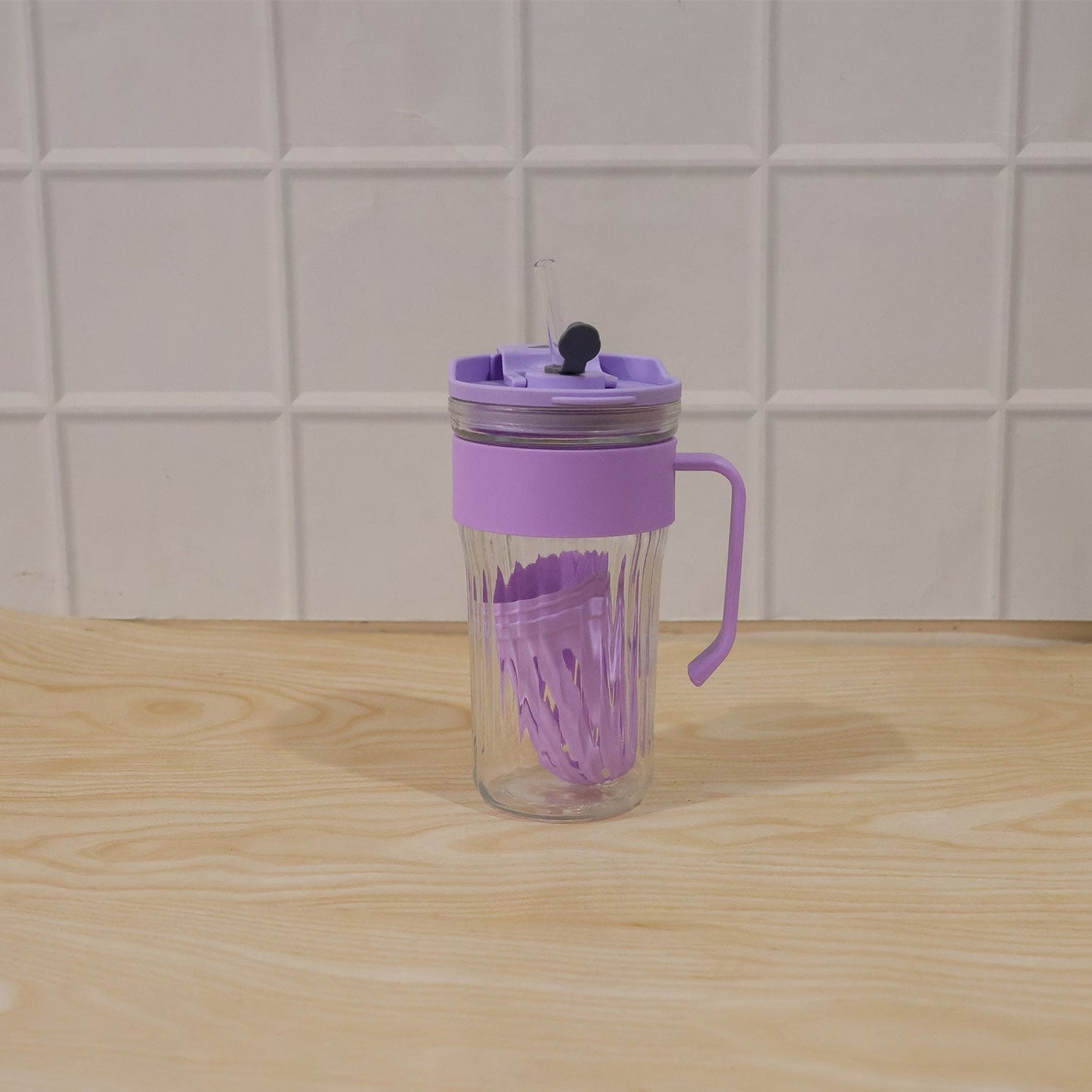 Wukusy glass tumbler with lid, straw, and handle for cold beverages and juice, shown with clear glass and black lid.