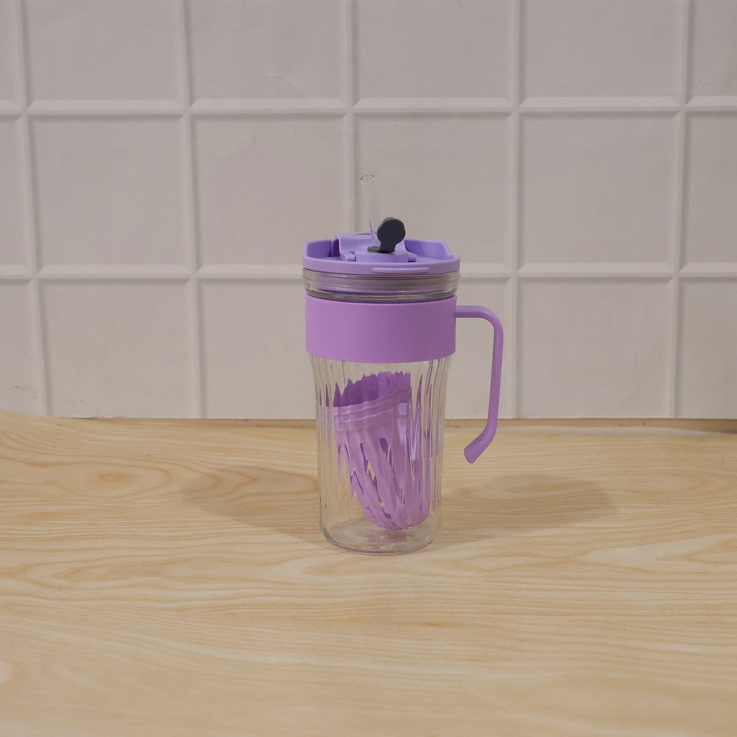 Wukusy glass tumbler with lid, straw, and handle for cold beverages and juice, shown with clear glass and black lid.