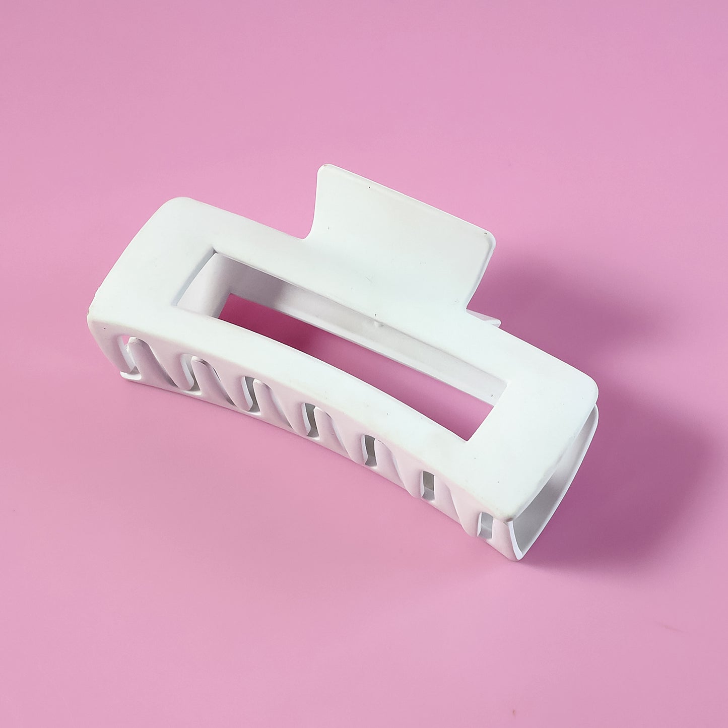 Large stylish plastic hair clip by Wukusy, featuring a sleek design and secure grip, perfect for hair styling.