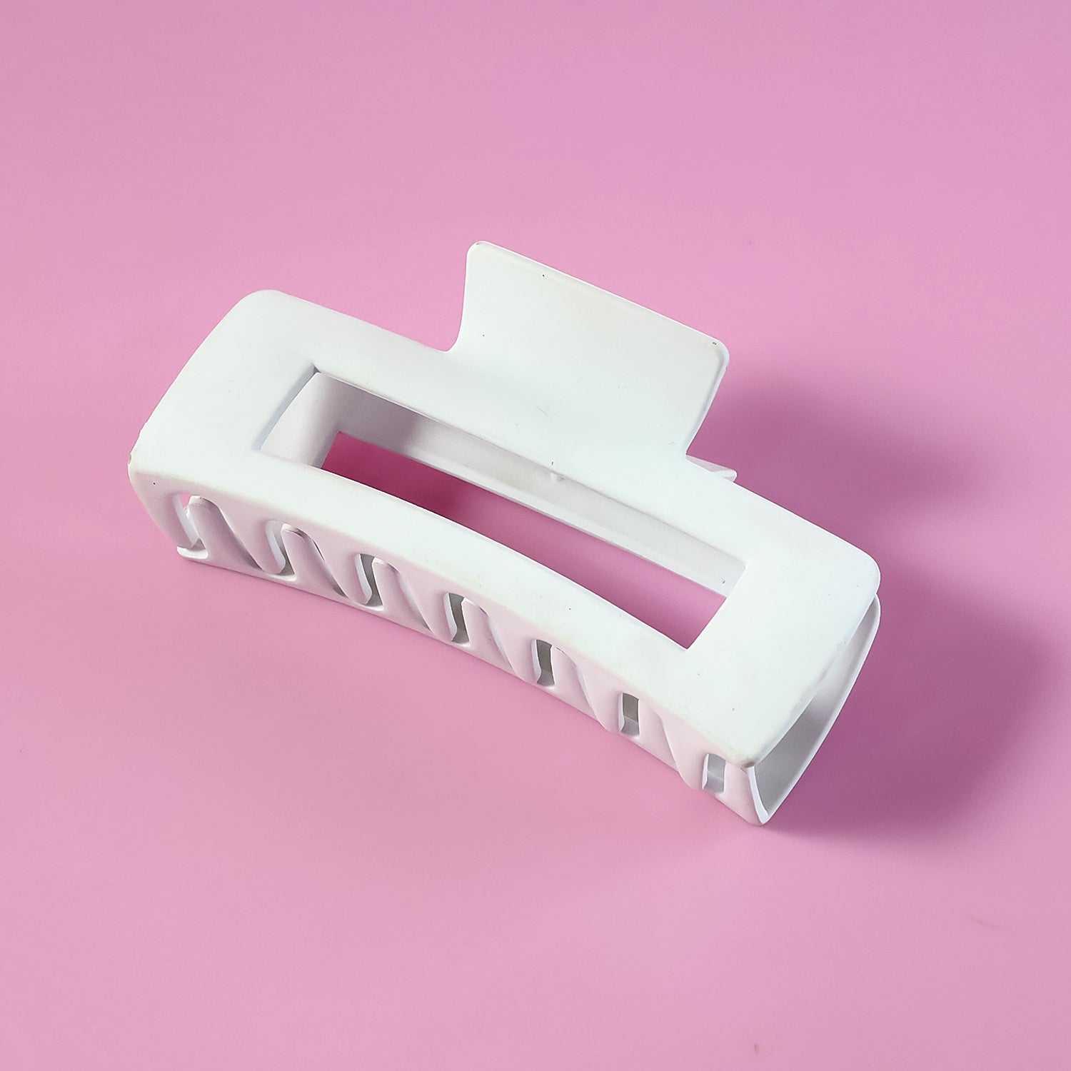Large stylish plastic hair clip by Wukusy, featuring a sleek design and secure grip, perfect for hair styling.