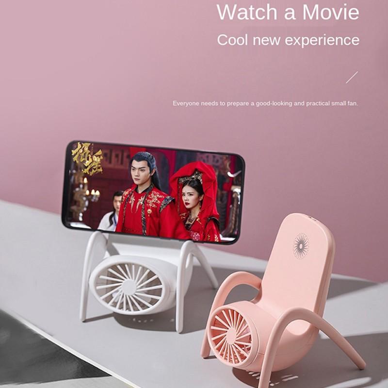 Wukusy portable mobile phone holder fan, handheld personal fan with adjustable settings, battery not included, for home use.