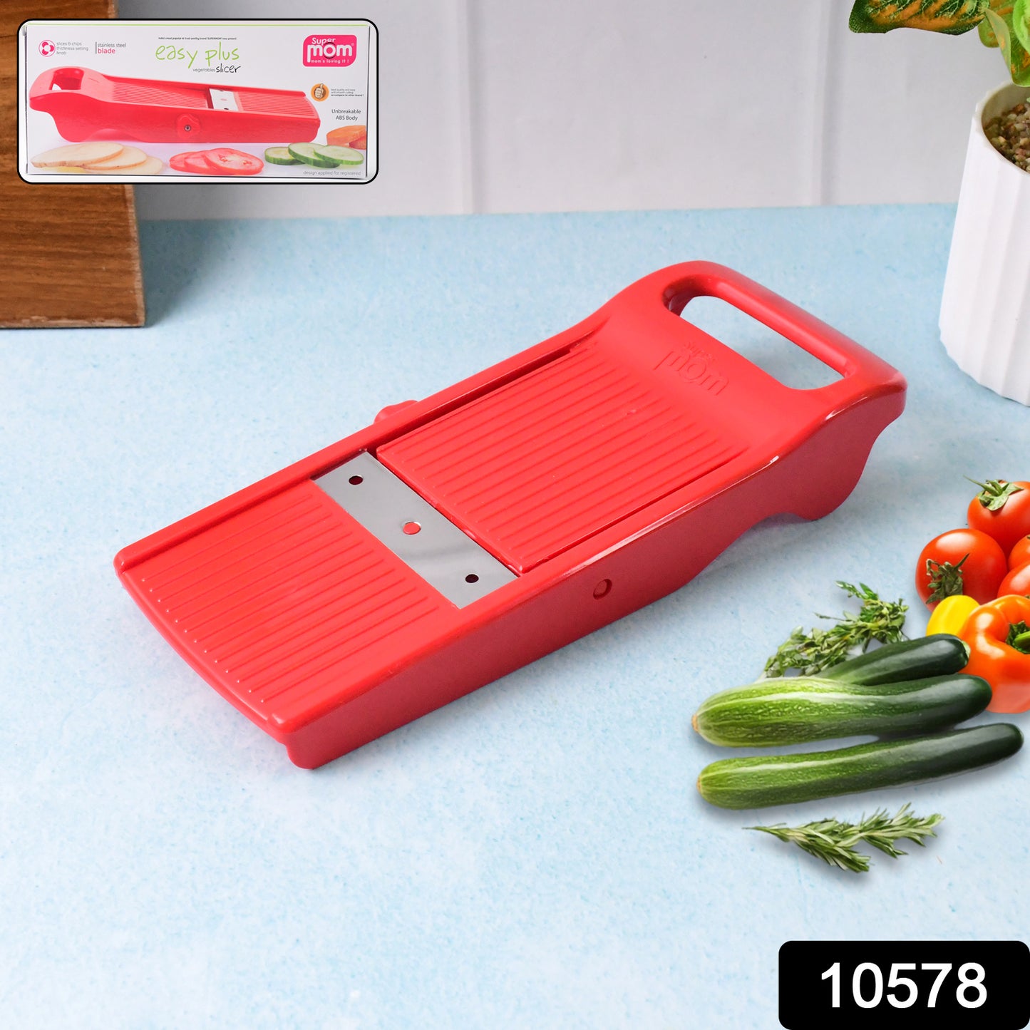 Wukusy Supermom Easy Plus vegetable slicer for home kitchen, showing the compact, multi-blade slicer with vegetables ready to be sliced